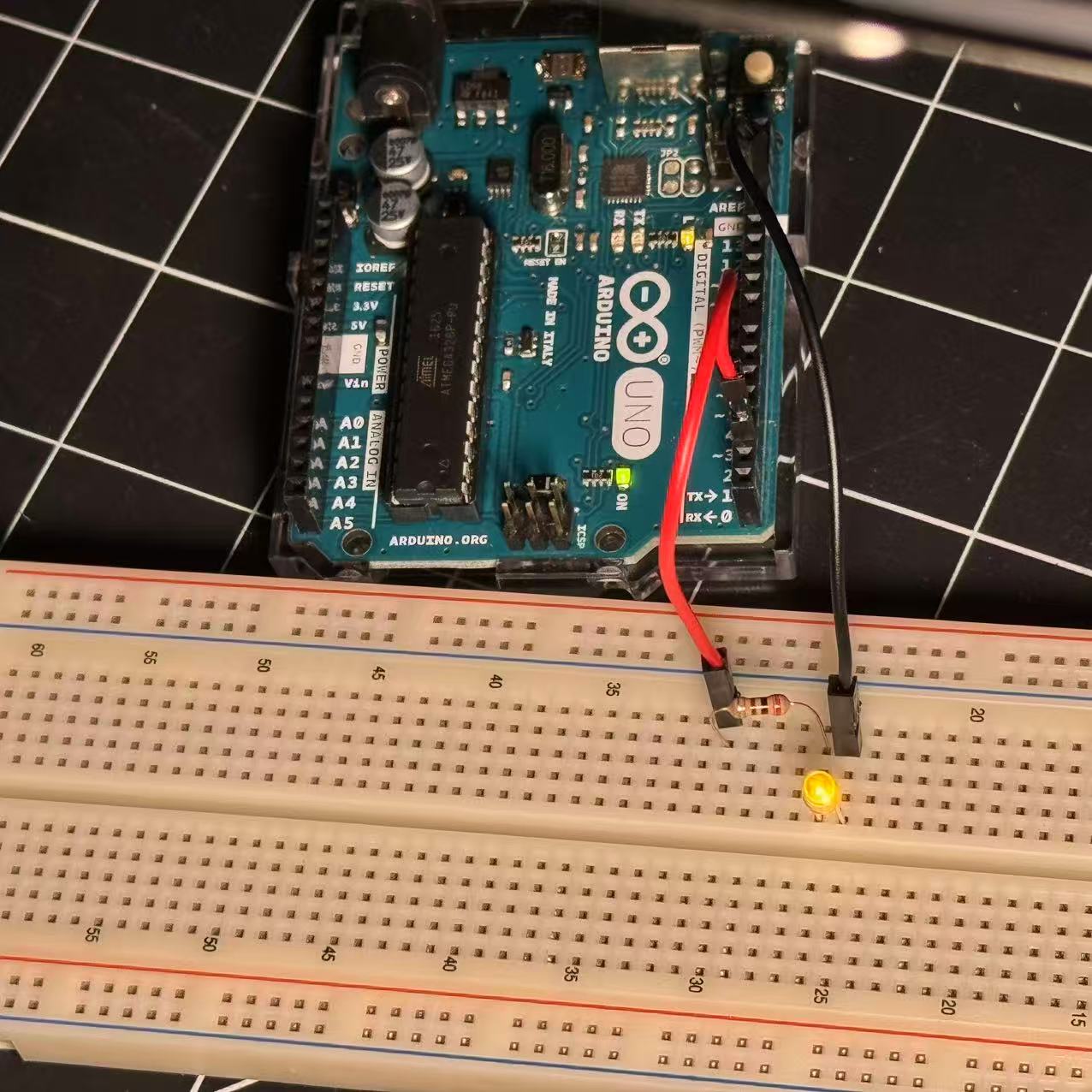The issue has been resolved—it was caused by a misspelled letter in the code that prevented it from running. Now the light bulb illuminates in a different color.